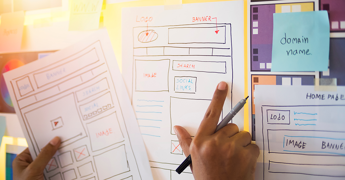 Designer drawing visual plan of an application 